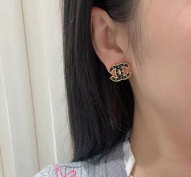 Chanel Black Star Earrings